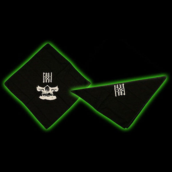 Black triangular patches with glowing edges and skull emblems on Yami Bandana