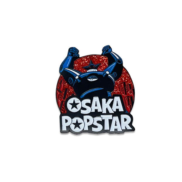 Stylized Osaka Popstar logo with cartoon monster face for Giant Robot Enamel Pin