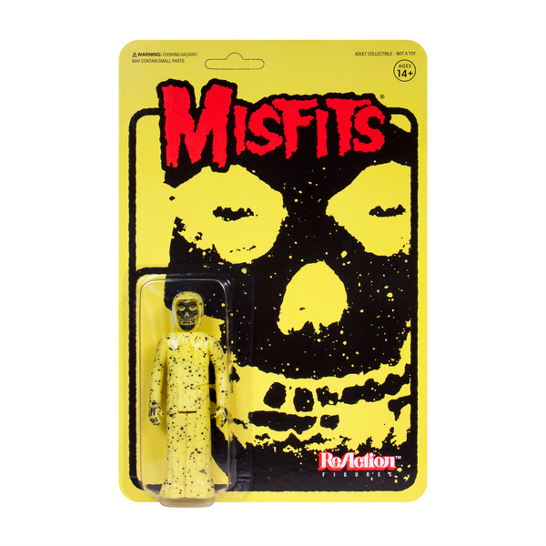 Misfits Fiend action figure packaging with yellow skeletal figure and logo design