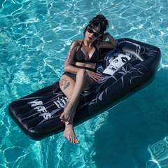 Inflatable Misfits Pool Float featuring a black and white portrait design