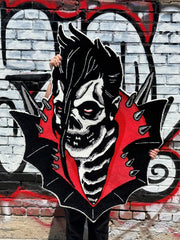 Stylized skull graffiti with red accents on the Jerry Only Anti-Hero Rug