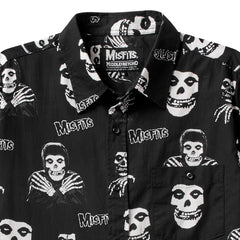 Black short sleeve button-up shirt with skull and Misfits designs all over