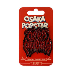 Enamel pin with stylized flame design on red card from Kawaii Black Metal set