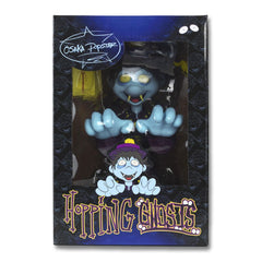 Cartoonish blue Osaka Popstar Hopping Ghosts vinyl figure with glowing yellow eyes