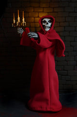 Skeletal Misfits Fiend clothed action figure in a red robe holding a candelabra