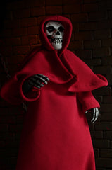 Skeleton figure in a bright red hooded robe from Misfits Fiend clothed action figure