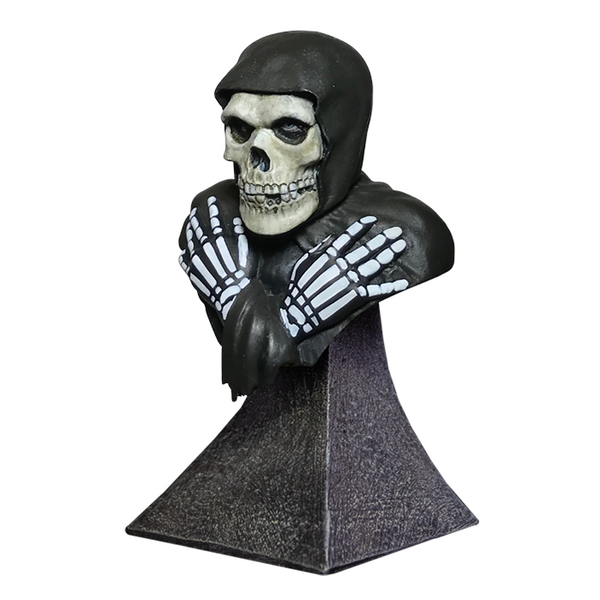 Bust of a skeletal figure in a hood with gloves, showcasing MISFITS FIEND mini bust